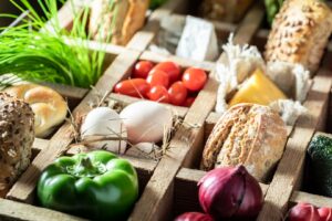 Healthy and delicious sandwich with vegetables, cheese and herbs